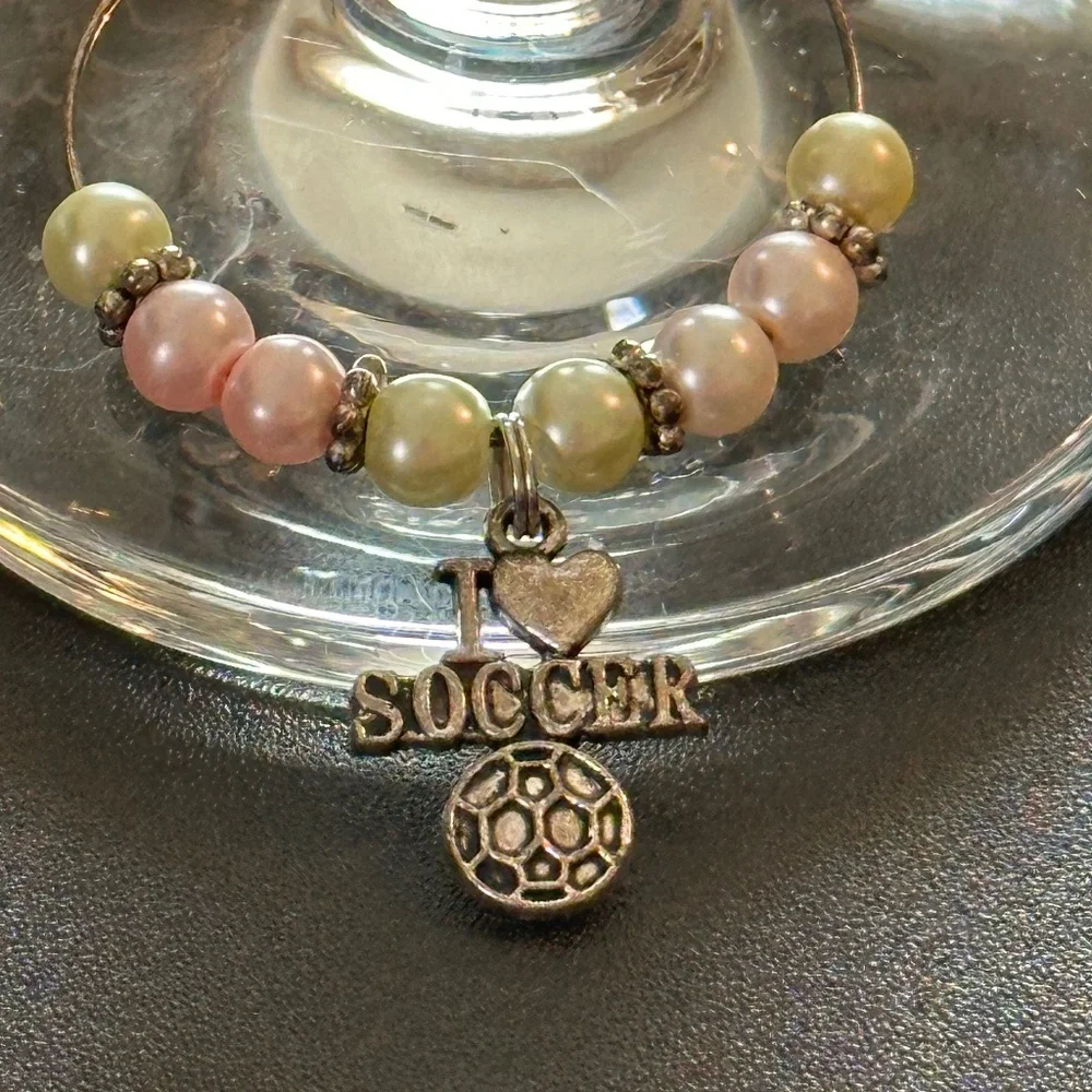 Wine glass tag, stainless steel hoop, yellow/pink beads, soccer charm
